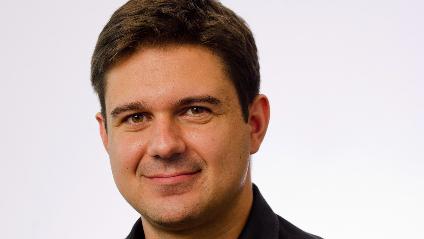 headshot of Tiberio Caetano