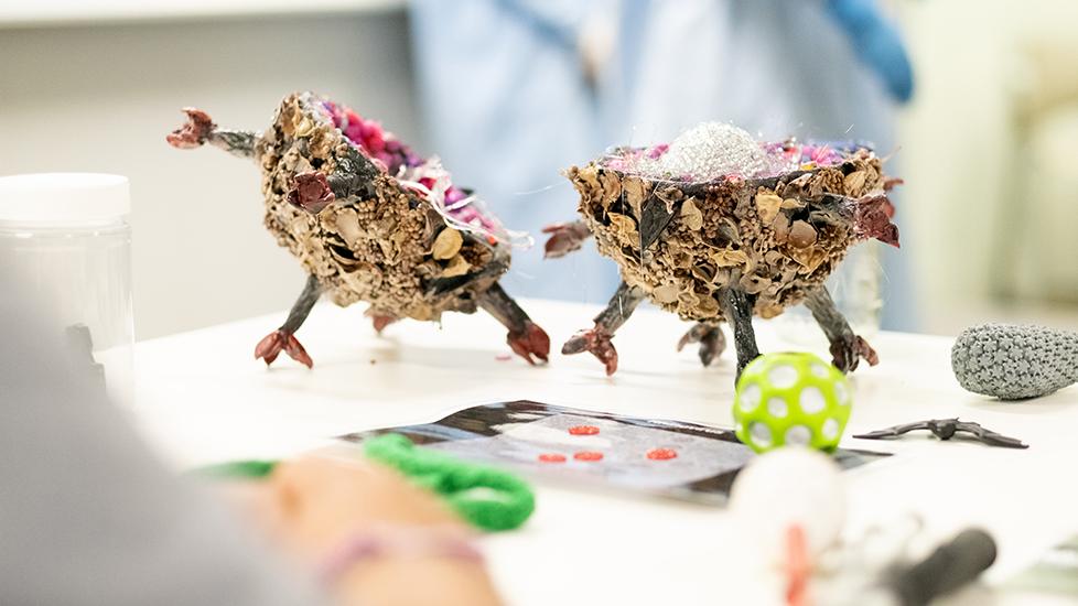 Tactile models of viruses, including paper mache model of HIV