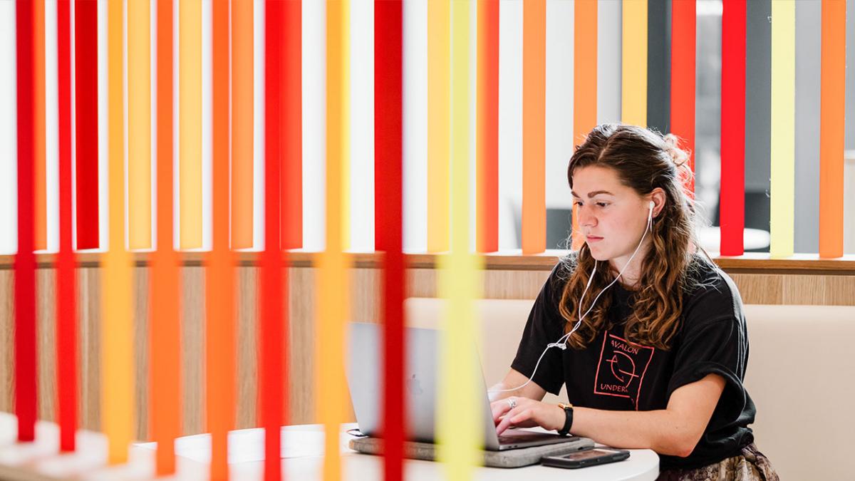 photo of a student on her laptop