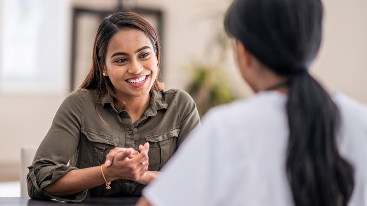 UNSW Postgraduate student speaking with a mentor